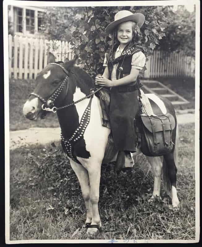 Colorize Old Photos for Free With MyHeritage in Color (And So Much More) 4 Sepia image of a young girl in a cowgirl costume on a pony