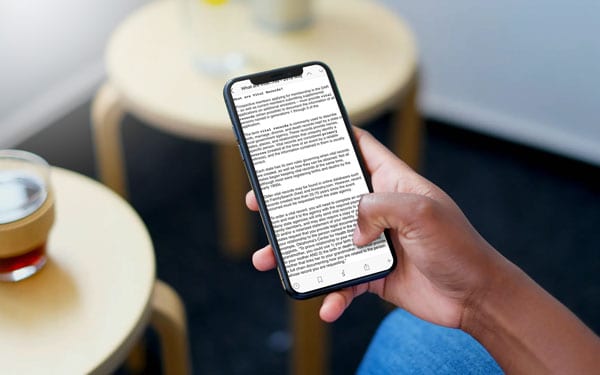 Using Scrivener For Family History Writing Projects 6 A hand holding an iPhone with the Scriviener app open.