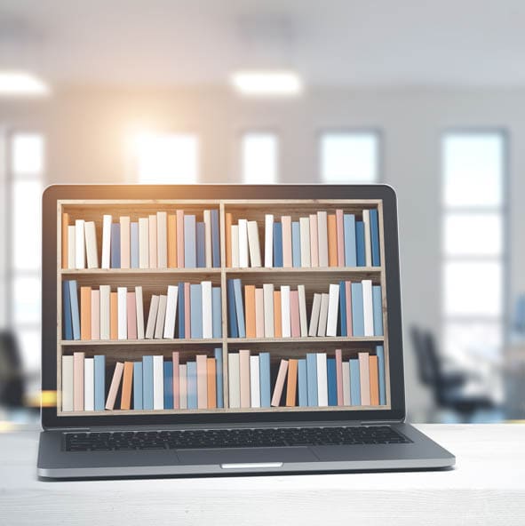 Lectures 22 Image of a laptop computer with shelves of books on the screen.