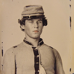 Lectures 15 Sepia image of a young confederate soldier in uniform.