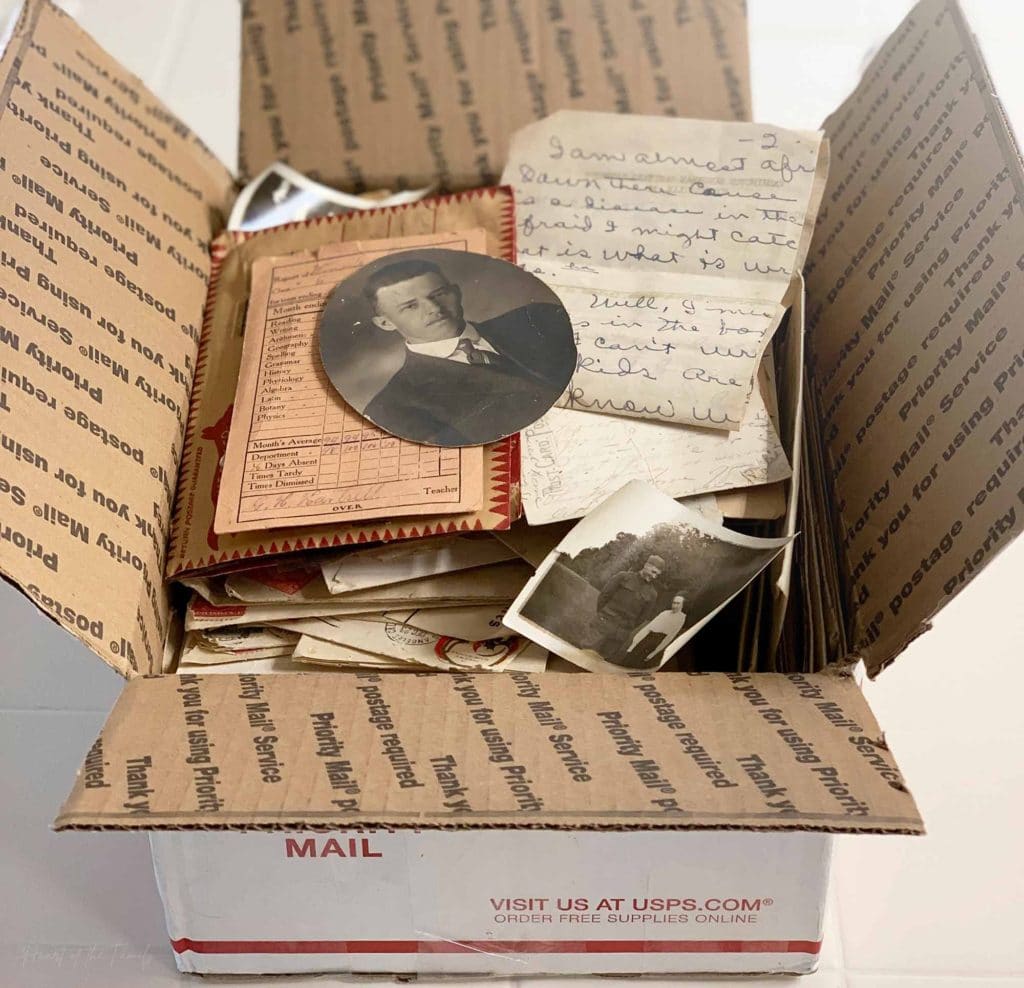 5 Top Tips for Using eBay for Family History 5 A USPS box opened to display a variety of old photos, letters, and other ephemera from eBay.
