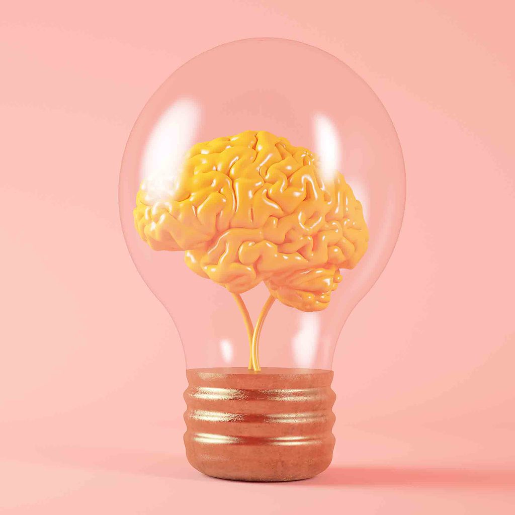 Lectures 17 Yellow model of a brain inside a clear lightbulb with a pink background.