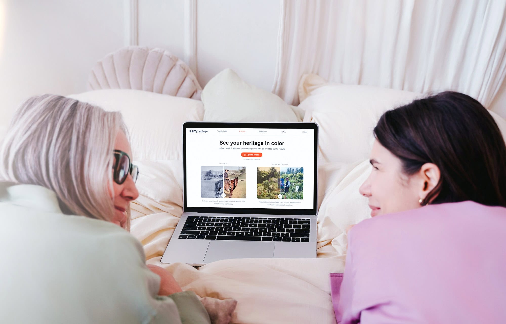 Two women looking at a laptop computer